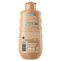 Garnier Ambre Solaire Natural Bronzer Self Tan Lotion 200ml slider