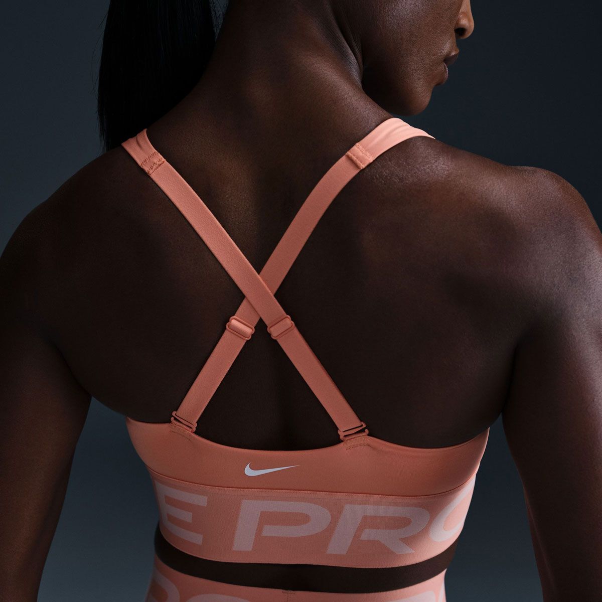 Nike Pro Womens Indy Dri-FIT Plunge Medium Support Padded Sports Bra - Apricot slider